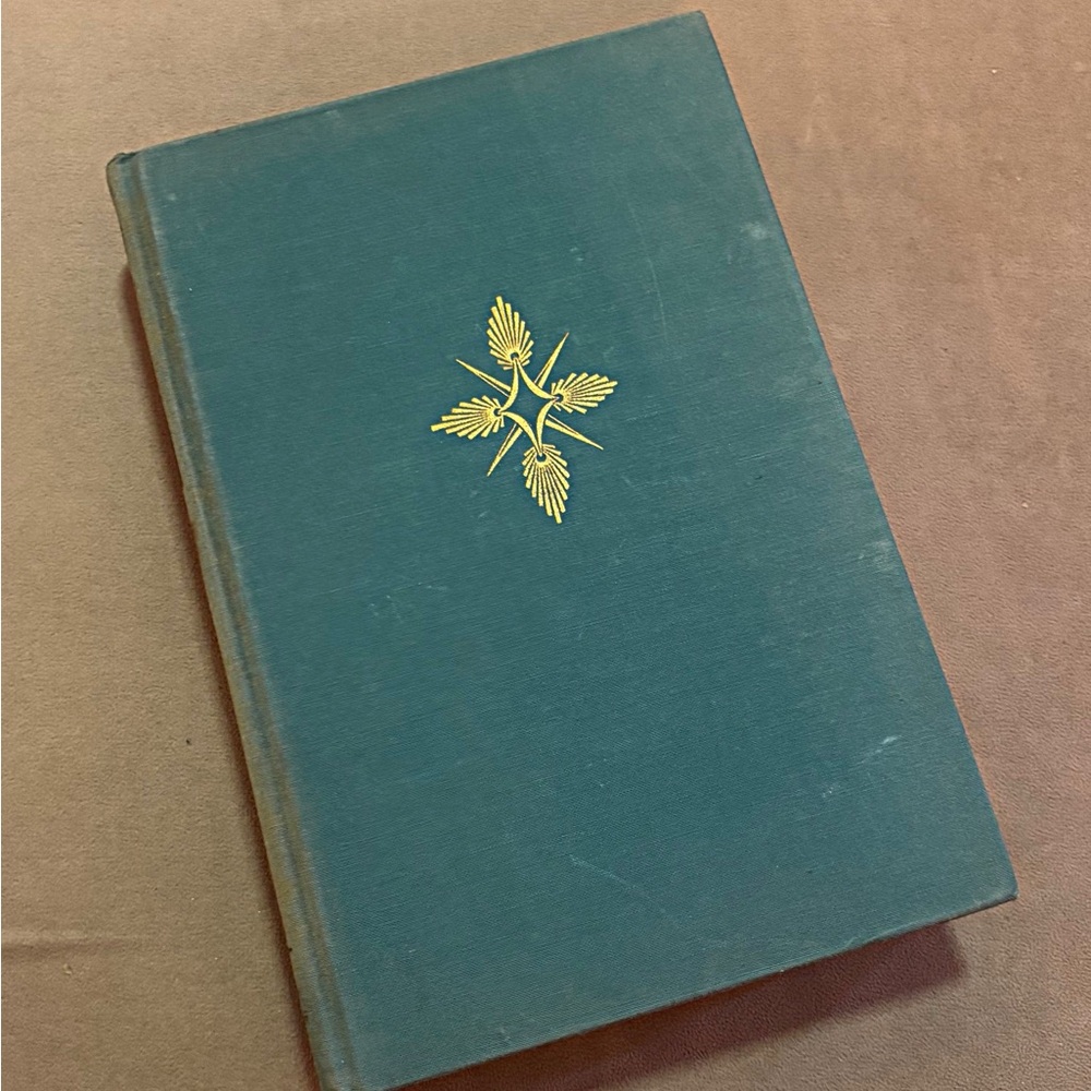 Vintage Hardcover Book with Gold Emblem